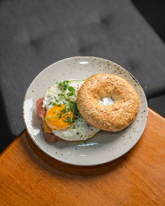 Breakfast Bagel on a speckled plate