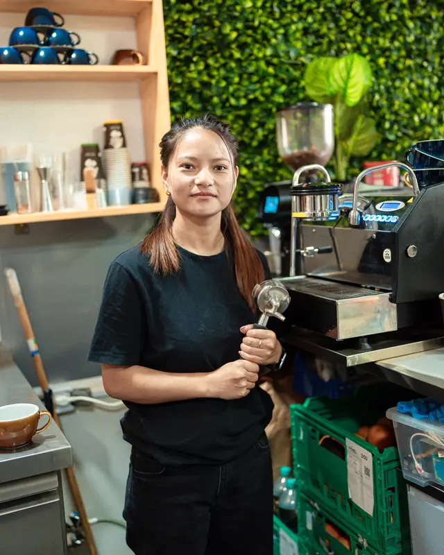 A Hideout barista at the espresso machine